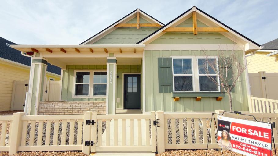 Front of Cardinal floorplan painted green showing front porch
